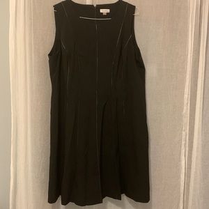 Sleeveless black fitted dress size 22W. Very flattering cut.